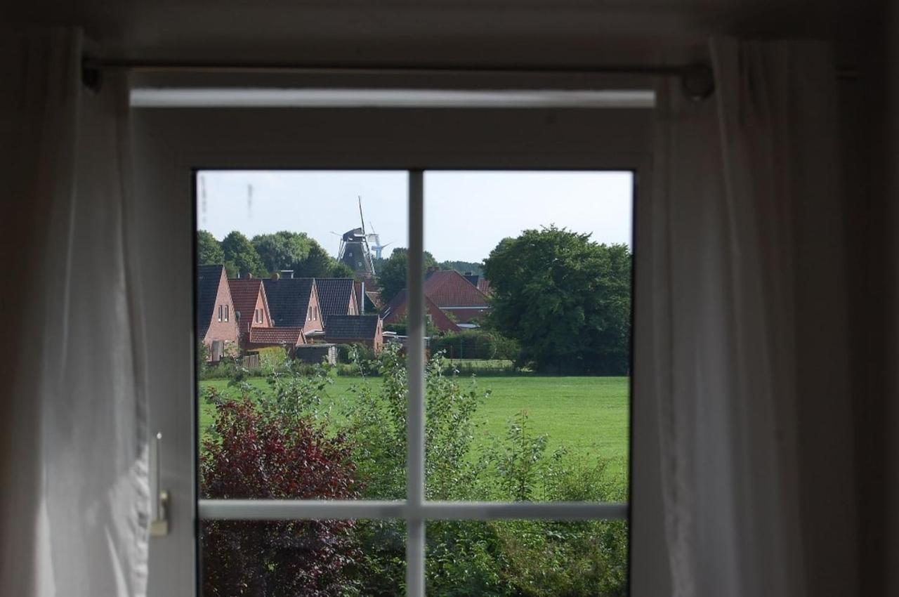 Ferienwohnung Im Gulfhof Krummhörn المظهر الخارجي الصورة