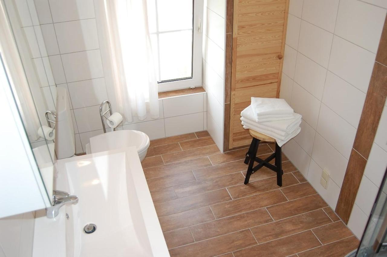 Ferienwohnung Im Gulfhof Krummhörn المظهر الخارجي الصورة